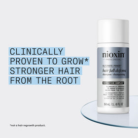 NIOXIN textured foam on hand demonstrating gentle effective cleansing