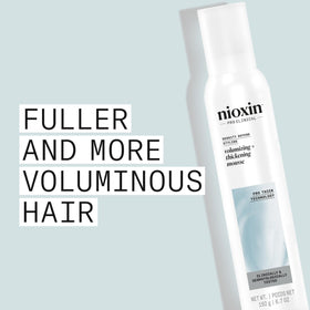 Nioxin close-up of ProThick technology label emphasizing thickening benefit