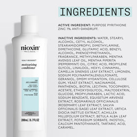 Nioxin conditioner with green tea leaves highlighting natural extract benefit