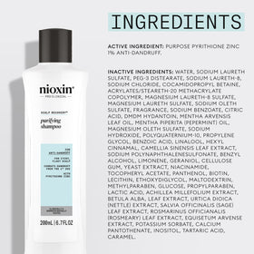 Nioxin pouring product onto palm showing creamy consistency for controlled application