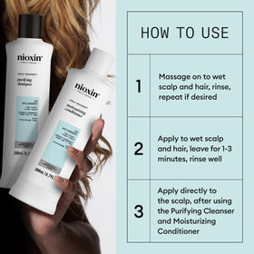 NIOXIN trial-size bottles in hand showing convenient travel-friendly scale