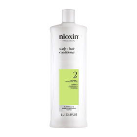 NIOXIN front packaging showing product benefits and size