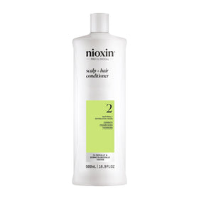 Nioxin front bottle showing product and fuller-hair benefit