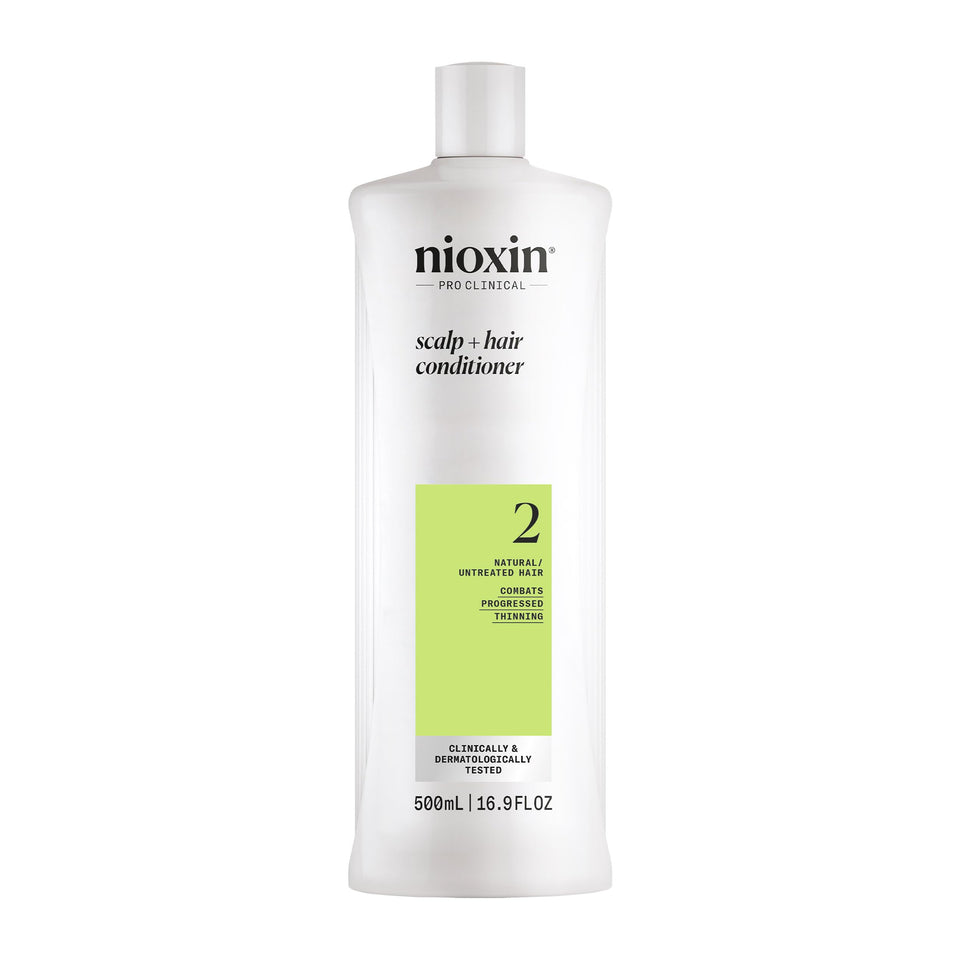 Nioxin front bottle showing product and fuller-hair benefit
