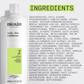 Nioxin bottle staged in bathroom conveying professional routine