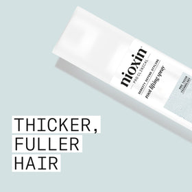 Close-up of hair texture after Nioxin spray adding visible fullness