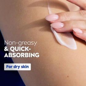 NIVEA bottle next to a hand to show 33.8 fl oz scale and value