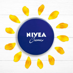 NIVEA creme being applied to hands to demonstrate quick absorption benefit