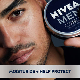 NIVEA MEN cream being applied to hands to restore moisture and soften skin