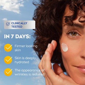 Applying NIVEA Q10 cream from hand to face for hydration and wrinkle care