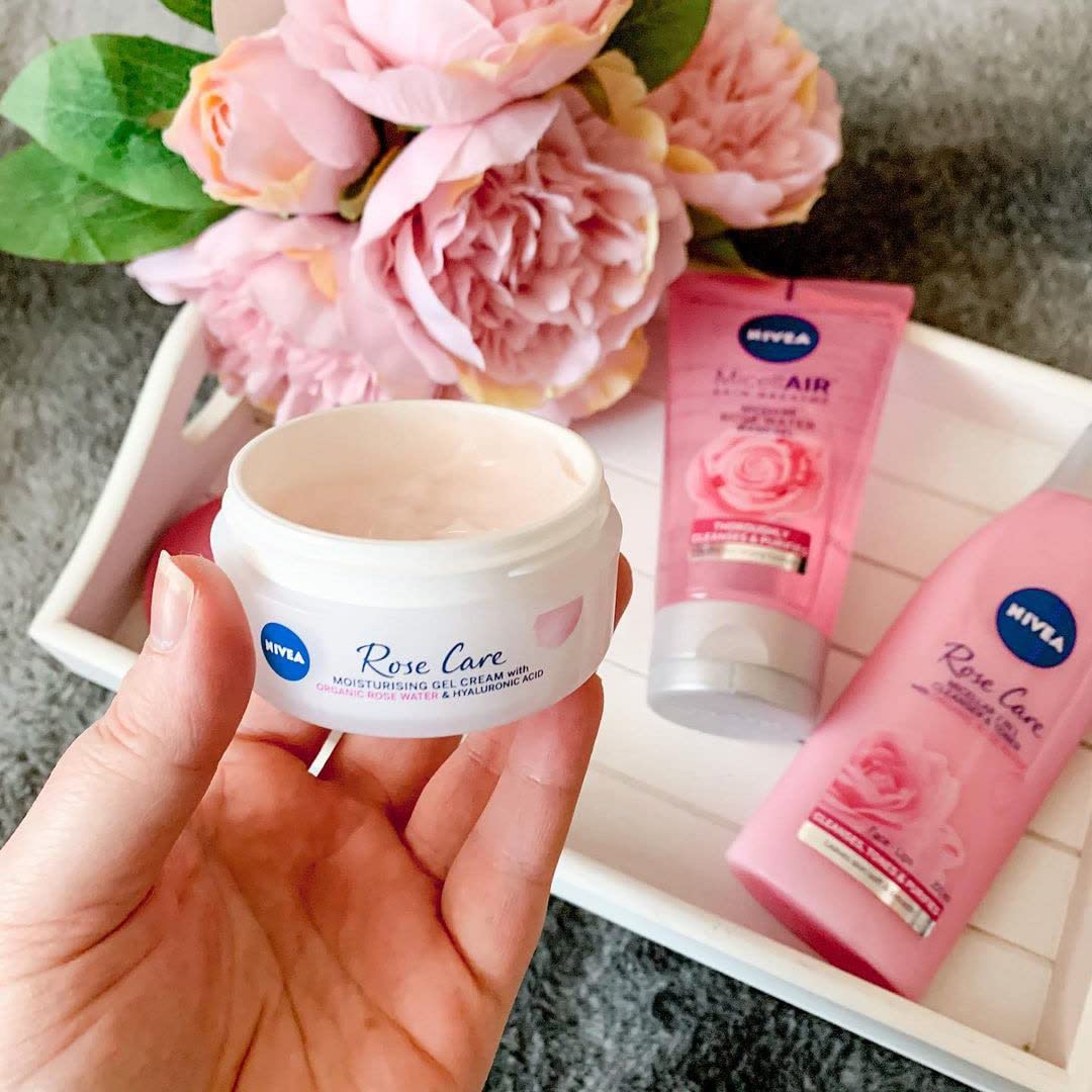 NIVEA jar on bathroom vanity styled with rose petals to suggest gentle daily ritual