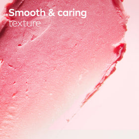 NIVEA applying balm to lips demonstrating luminous sheen and softness