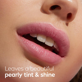 NIVEA stick next to a hand to show compact size and on-the-go convenience