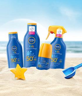 Nivea Sun spray in use on child at beach offering extra waterproof protection