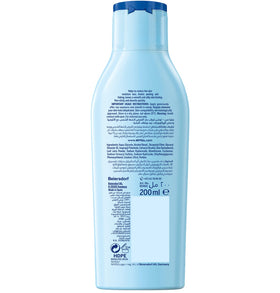 Nivea Sun pump dispense action dispensing lotion for controlled, hygienic use