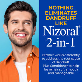nizoral foamy texture on hand illustrating gentle conditioning