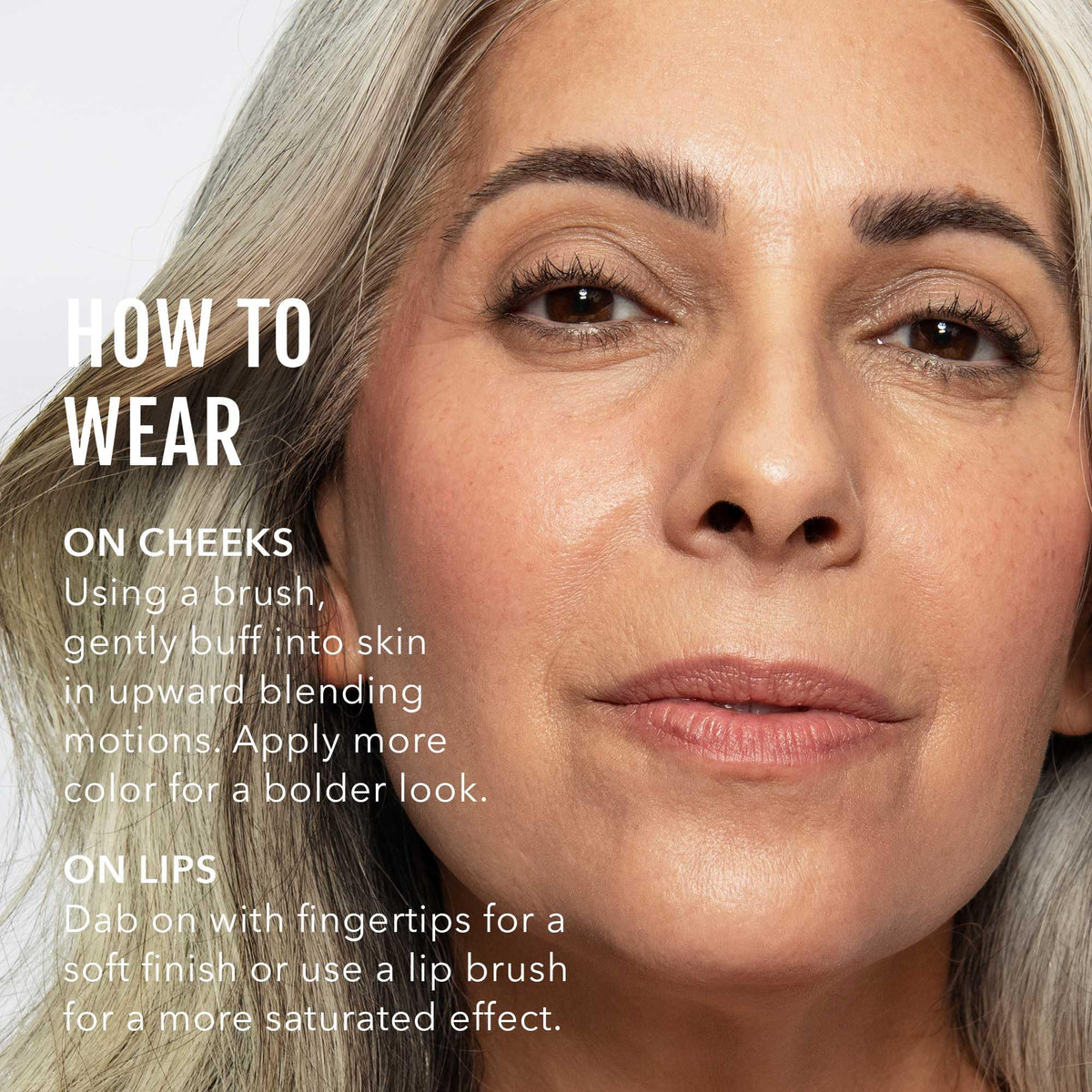 No Makeup Makeup applying blush to cheek demonstrating natural finish