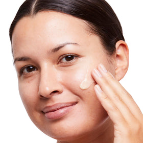 No7 close-up of cream on fingertip, shows easy application and quick absorbency