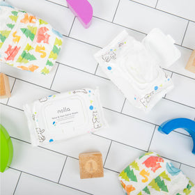 Nolla wipes in stroller pocket for easy on-the-go cleanup