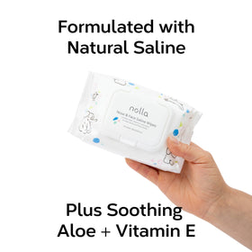 Nolla wipe in hand demonstrating gentle wipe for baby nose and face
