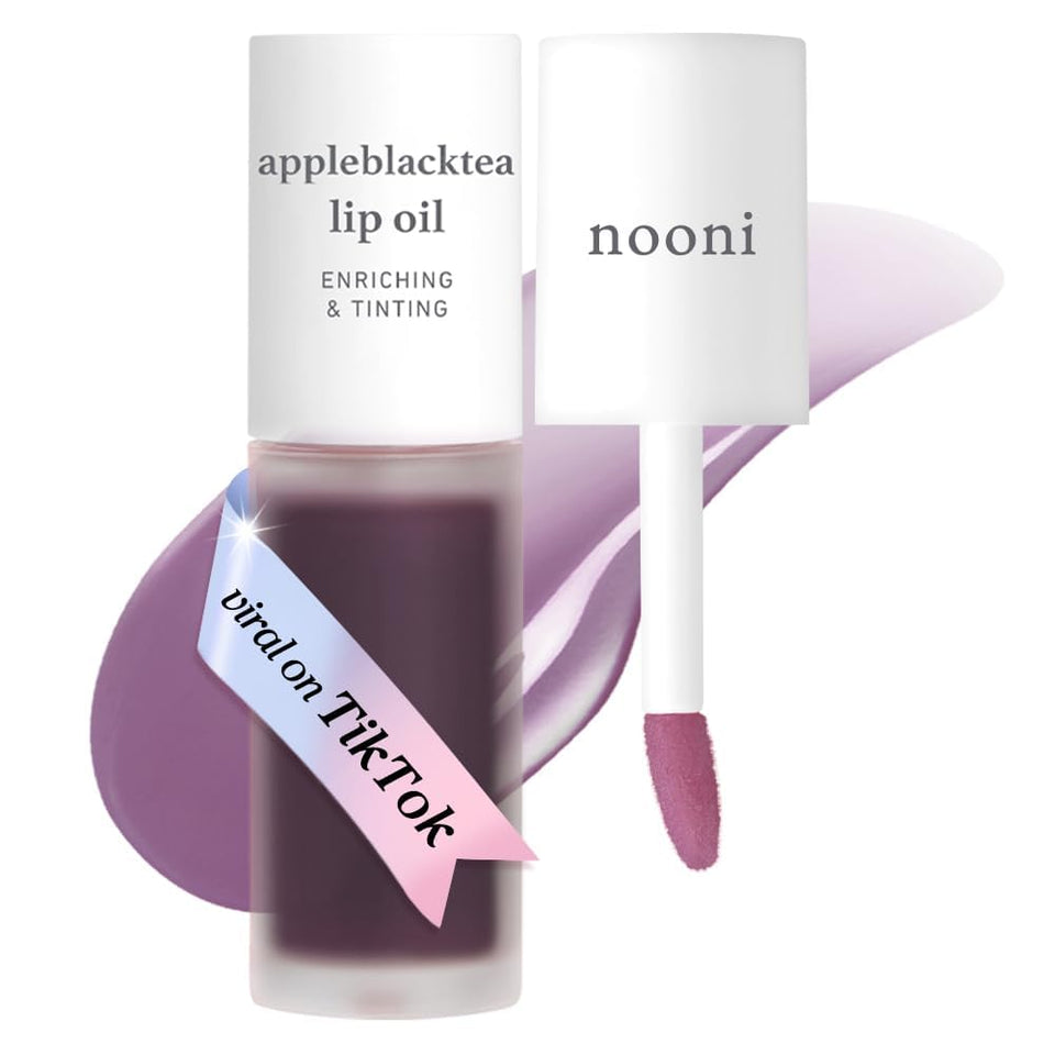 NOONI front tube of Appleblacktea lip oil showing glossy finish and pocket-size convenience