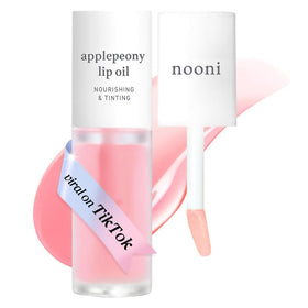 NOONI front packaging showing compact tinted lip oil and shade name