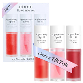 NOONI front packaging showing three mini lip oils and product benefit