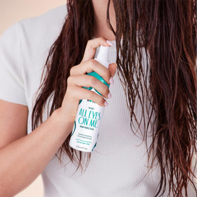 Not Your Mother's bottle next to ruler showing 6 fl oz size for travel-friendly use