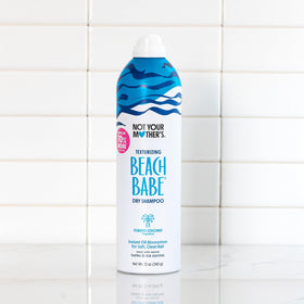 Not Your Mother's can held in hand to show size and generous number of uses