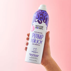 Not Your Mother's spray in use on roots demonstrating quick refresh and added body