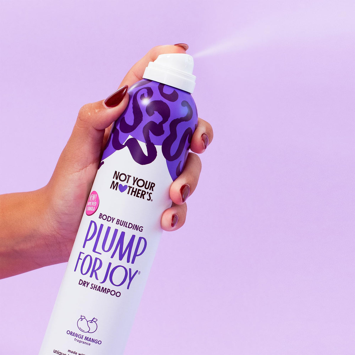 Not Your Mother's starch texture on fingertips showing lightweight oil control