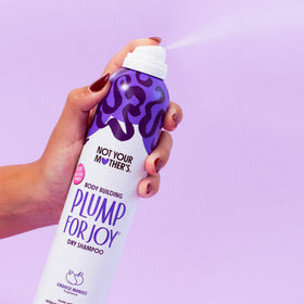 Not Your Mother's starch texture on fingertips showing lightweight oil control