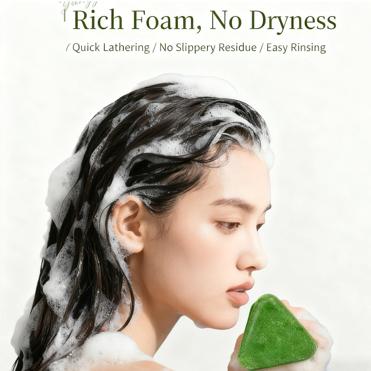 NovaCharm shampoo bar beside a hand to show scale and long-lasting size