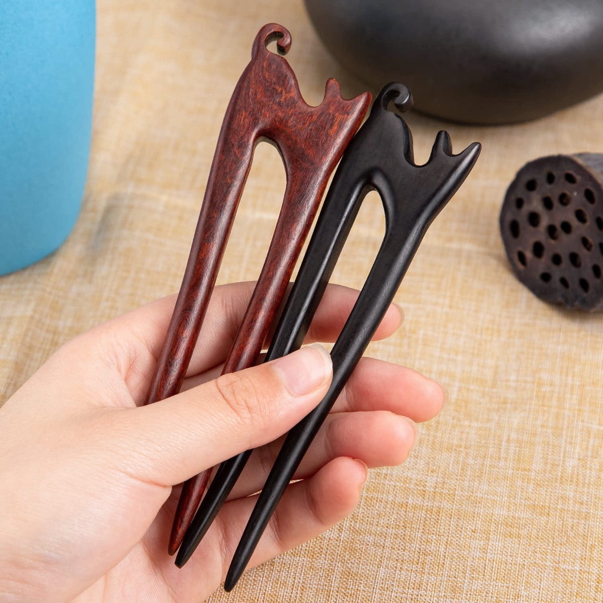 noverlife hair sticks inserted in bun showing stable hold and tidy finish
