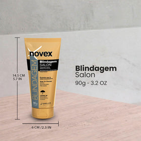 NOVEX bottle in hand size comparison, compact travel-friendly thermal protector