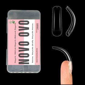 NOVO OVO front box packaging showing 100 clear long nail tips, clear presentation benefit
