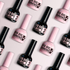 NOVO OVO pink bottle gel close-up highlighting dual glue and builder benefit