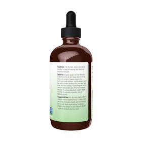 NOW Foods argan oil close-up texture on palm, benefit: easily absorbed hydration