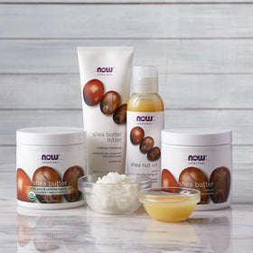 NOW Foods shea butter next to hand to show 16-ounce scale and value benefit