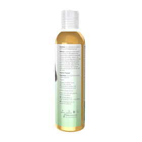 NOW Foods jojoba oil pouring to show silky texture for easy absorption benefit