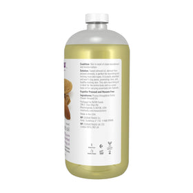 NOW Foods sweet almond oil pouring from bottle showing texture and clarity