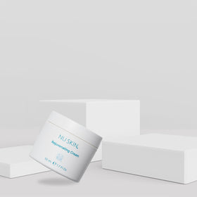 Nu Skin cream on fingers ready to apply for fast absorption
