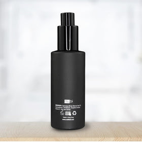 Detailed shot of Nubi Marula serum packaging and pump mechanism for premium feel