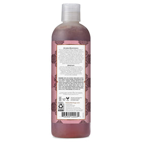Nubian Heritage pump dispensing body wash, showing creamy texture and moisturizing benefit