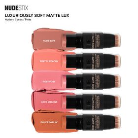 Nudestix Nudies Matte Lux beside coin showing compact travel-friendly size