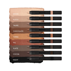 Nudestix pencil held in hand for size scale and travel-ready benefit