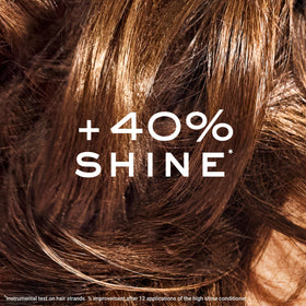 NUXE conditioner being applied in shower to demonstrate detangling and ease of use