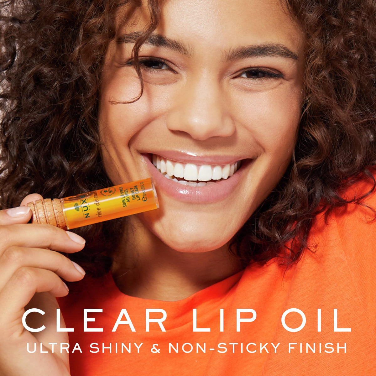 NUXE honey-spoon applicator detail for precise, mess-free application benefit