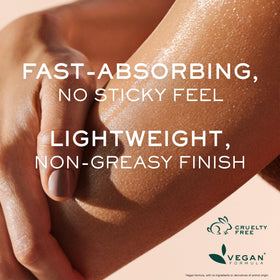 NUXE hand applying oil on arm for hydrated, satin-finish skin
