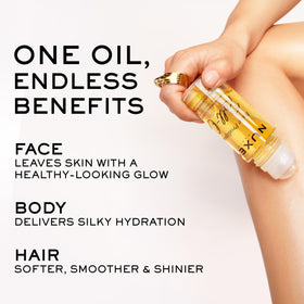 NUXE roll-on smoothing through hair ends to add shine